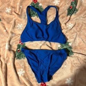 blue swim suit worn once! great quality cute knot detail on top!